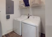 Thumbnail 11 of 36 - a washer and dryer in a laundry room at Autumn Park Apartments, North Carolina