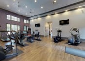 Thumbnail 17 of 36 - fitness center with exercise equipment at Autumn Park Apartments, North Carolina