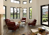 Thumbnail 15 of 20 - Beautiful ceiling lights in modern living room with dining at Azola West Palm Beach, West Palm Beach, FL, 33411