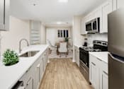 Thumbnail 2 of 42 - Modern Kitchen at Bridgewater Apartments, Duluth, GA
