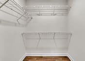 Thumbnail 16 of 42 - Empty white closet at Bridgewater Apartments, Duluth, GA
