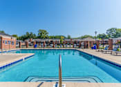 Thumbnail 14 of 23 - A large swimming pool at Brightwaters Apartments, Little Rock, AR