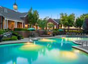 Thumbnail 15 of 19 - Swimming Pool with Relaxing Poolside Patio at Cambridge Square Apartments, Overland Park, KS 66211