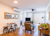 Thumbnail 6 of 25 - Living Room With TV at Carson Street Towers, Overland Park, KS 66223