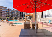 Thumbnail 15 of 25 - Poolside Umbrella Chairs at Carson Street Towers, Overland Park, 66223