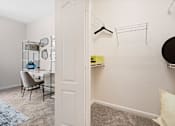 Thumbnail 9 of 42 - Spacious walk-in closet with wire shelving at Alden Place at South Square Apartments, North Carolina, 27707