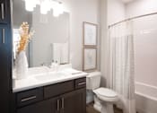 Thumbnail 9 of 22 - White Bathroom at City Place at Germantown Apartments, Tennessee
