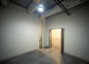 Thumbnail 6 of 23 - a small room with a door in the corner and a spotlight on the ceiling at Conwood Flats, Memphis, TN