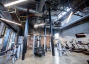 Thumbnail 19 of 23 - a gym with a lot of exercise equipment at Conwood Flats, Memphis, TN, 38107