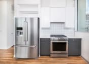 Thumbnail 10 of 41 - Kitchen appliances at Deca Apartments, Greenville, SC, 29601