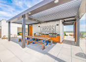 Thumbnail 25 of 41 - Grill and picnic at Deca Apartments, South Carolina