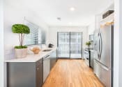 Thumbnail 6 of 41 - Apartment kitchenat Deca Apartments, Greenville, SC, 29601