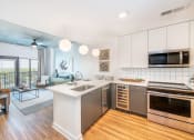 Thumbnail 1 of 41 - Kitchen at Deca Apartments, Greenville, South Carolina