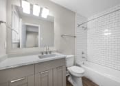 Thumbnail 8 of 20 - A white toilet is in a bathroom at Dunwoody Glen, Georgia