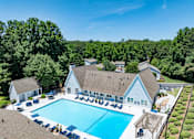 Thumbnail 1 of 20 - A large white building with a pool at Dunwoody Glen, Atlanta, 30360