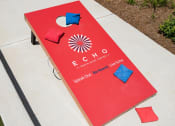 Thumbnail 21 of 34 - Enjoy a Game of Corn Hole with Friends at Echo at North Pointe Center Apartment Homes, Alpharetta, GA 30009