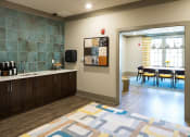 Thumbnail 15 of 34 - Cyber Cafe with Coffee Station and Work Areas for Residents at Echo at North Pointe Center Apartment Homes, Alpharetta, GA 30009