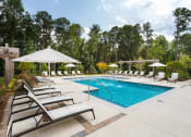 Thumbnail 25 of 34 - Gorgeous Modern Pool with Sunshelf and Lounge Chairs for Relaxing at Echo at North Pointe Center Apartment Homes, Alpharetta, GA 30009