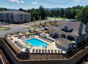 Thumbnail 17 of 21 - Swimming pool and pool deck at Fifth Street Place Apartments, Charlottesville, VA