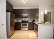 Thumbnail 3 of 21 - Fully Equipped Kitchen at Fifth Street Place Apartments, Virginia