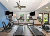 Thumbnail 20 of 40 - Cardio Equipment in Fitness Center located at Addison on Cobblestone located in Fayetteville, GA 30215