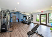 Thumbnail 23 of 40 - Large Fitness Center with cardio and strength training equipment located at Addison on Cobblestone located in Fayetteville, GA 30215