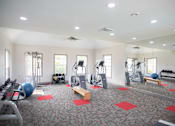 Thumbnail 21 of 30 - a spacious fitness center with treadmills and other exercise equipment at Appling Lakes, Cordova