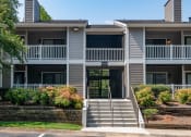 Thumbnail 17 of 19 - front view of an apartment building with stairs and balconies