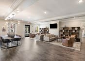 Thumbnail 16 of 30 - a living room with couches and chairs and a table at Arlo Luxury homes Apartments, Little Rock, 72210