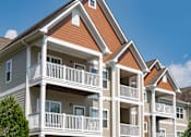 Thumbnail 17 of 28 - Bright Apartment Home Exteriors with Trees Inviting You Inside at Ashby at Ross Bridge, Hoover, AL 35226