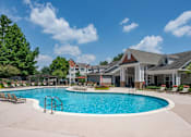 Thumbnail 15 of 28 - Resort-Inspired Swimming Pool with Lounge Chairs and WiFI Hotspot at Ashby at Ross Bridge, Hoover
