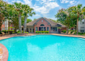 Thumbnail 25 of 30 - our apartments offer a swimming pool  at The Aster Sugar Land, Texas