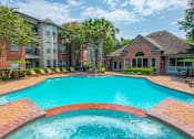 Thumbnail 1 of 30 - our apartments offer a swimming pool  at The Aster Sugar Land, Sugar Land, TX, 77498