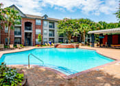 Thumbnail 24 of 30 - our apartments offer a swimming pool  at The Aster Sugar Land, Texas, 77498