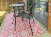 Thumbnail 12 of 21 - a patio with a table and chairs on a porch at Brightwaters Apartments, Little Rock, 72202