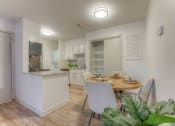 Thumbnail 1 of 21 - a dining room and kitchen with a table and chairs at Brightwaters Apartments, Little Rock, AR,72202