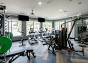 Thumbnail 21 of 32 - Gym at The Fenwick Apartment Homes, Humble, TX, 77396