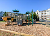 Thumbnail 26 of 31 - A playground at Henley at Mirror Lake, Villa Rica, 30180