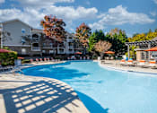Thumbnail 22 of 31 - A large swimming pool at Henley at Mirror Lake, Villa Rica