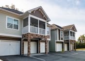 Thumbnail 33 of 34 - the exterior of a house with white garage doors at Legends at Chatham, Savannah, GA, 31405