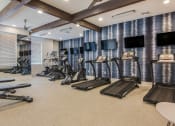 Thumbnail 21 of 28 - our state of the art gym is equipped with cardio equipment and televisions