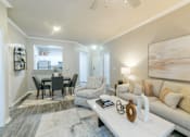 Thumbnail 4 of 23 - Living Room With Dining Area at Madison Shelby Farms, Memphis, TN