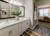 Thumbnail 8 of 23 - A bathroom with a white sink and a mirror above it. at Madison Shelby Farms, Tennessee, 38120