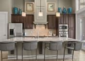 Thumbnail 27 of 31 - a kitchen with a marble counter top at The Ridge at Chenal Valley, Little Rock, AR 72223