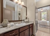 Thumbnail 6 of 31 - a bathroom with a sink and a mirror at The Ridge at Chenal Valley, Arkansas, 72223