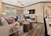 Thumbnail 4 of 31 - a living room with a couch and a tv at The Ridge at Chenal Valley, Little Rock, Arkansas