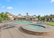 Thumbnail 13 of 31 - a pool with chairs and a spa in front of a house at The Ridge at Chenal Valley, Arkansas, 72223
