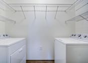 Thumbnail 14 of 38 - Laundry Room at The Ridge at Chenal Valley Apartments, Little Rock, AR