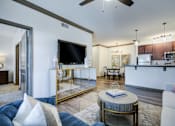 Thumbnail 5 of 38 - Living Room with TV at The Ridge at Chenal Valley Apartments, Arkansas