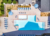 Thumbnail 16 of 27 - arial view of a swimming pool in a backyard with umbrellas and chairs at The Shallowford, Chattanooga